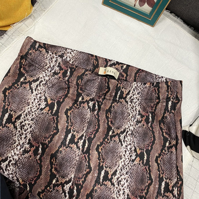 Snake Pattern Flare Pants in brown