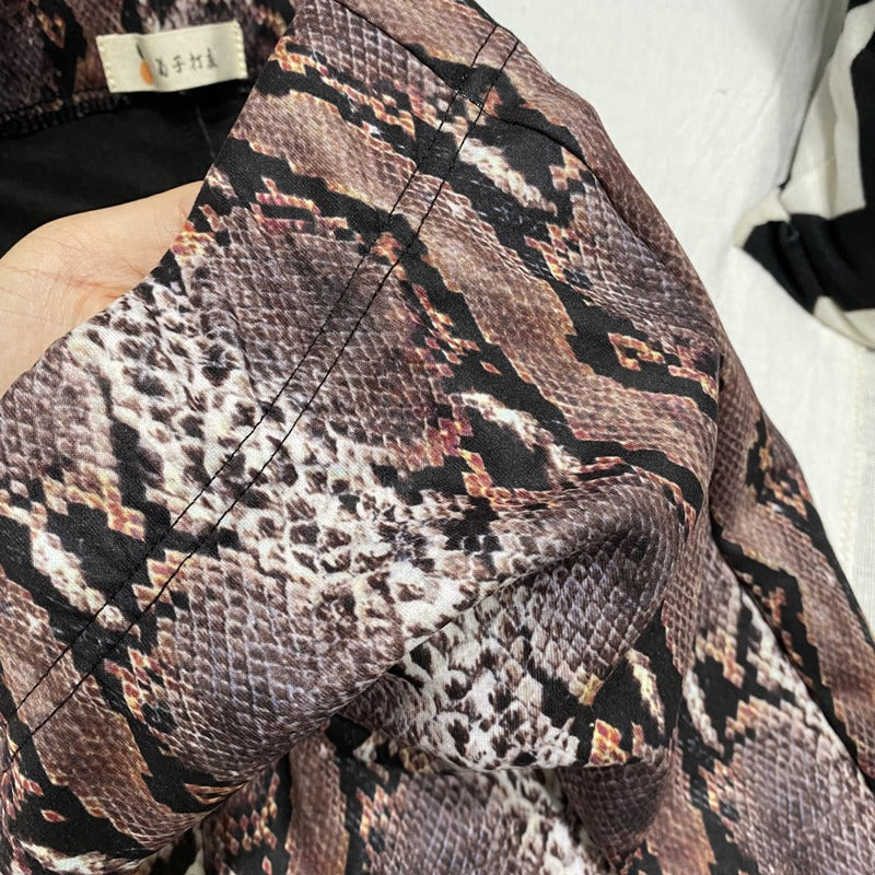 Snake Pattern Flare Pants in brown