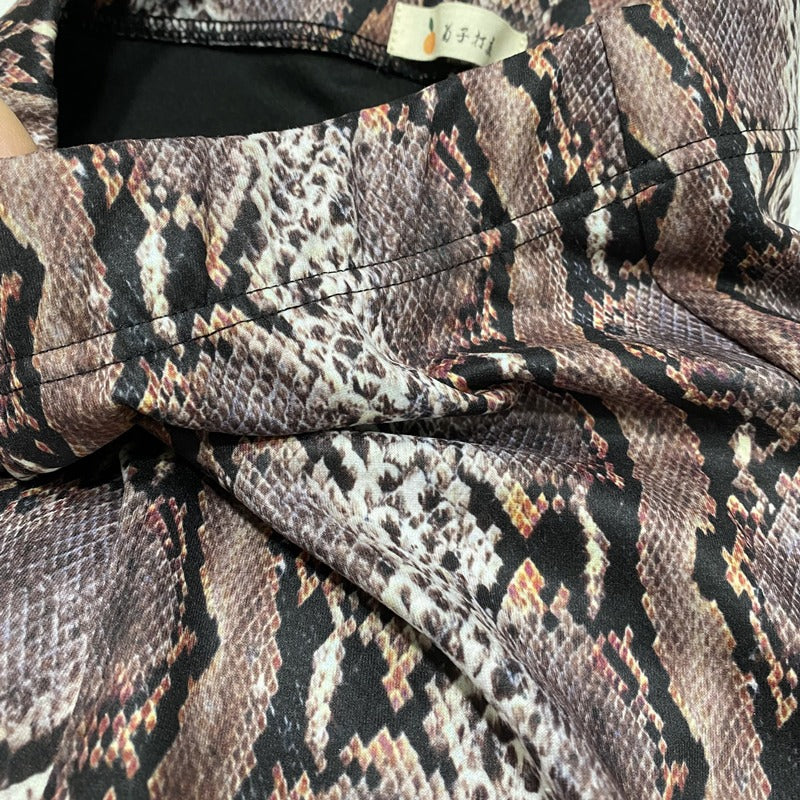 Snake Pattern Flare Pants in brown