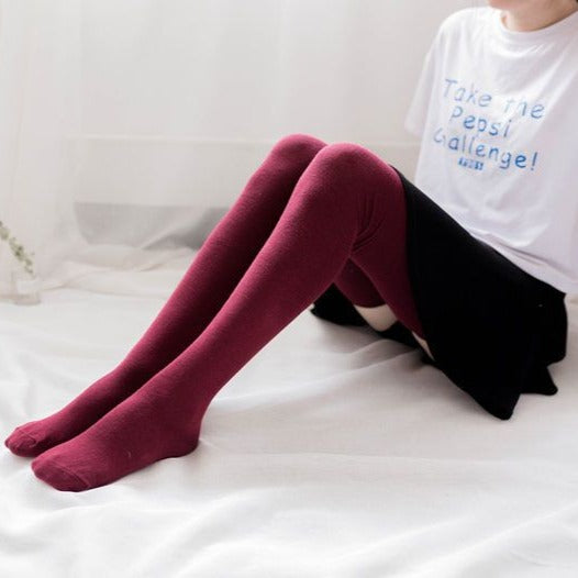 femboy thighs in claret thigh highs